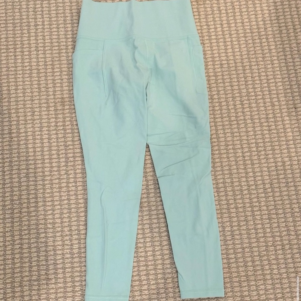 Athleta Salutation Stash Pocket II 7/8 Tight Leggings